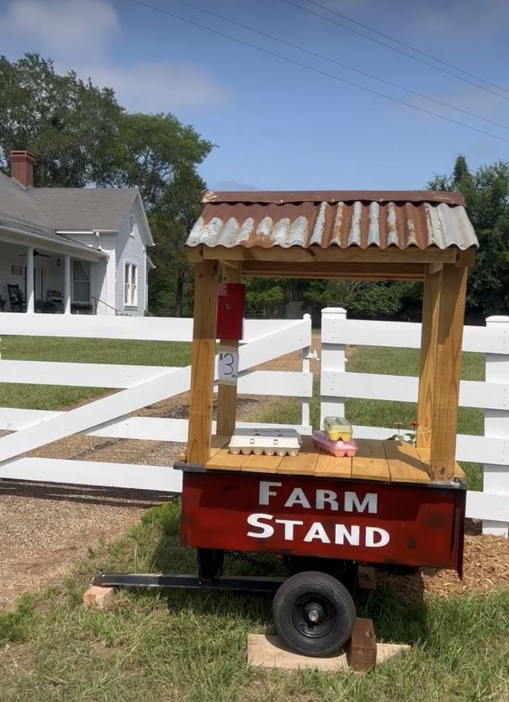 an old fashioned farm stand in the yard