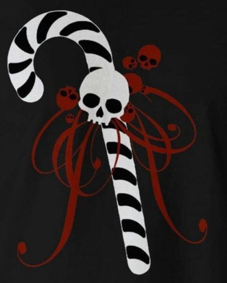 a black t - shirt with a candy cane and skulls on the front is shown