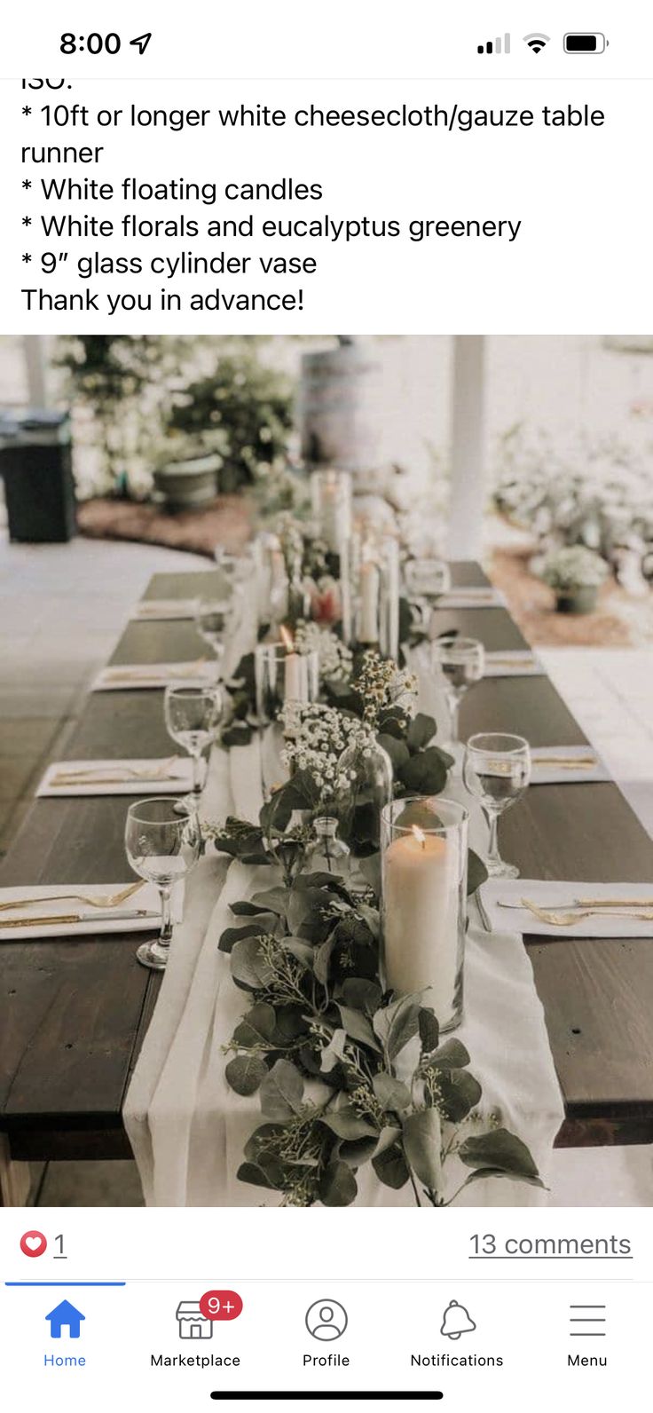 a long table with candles and greenery on it is featured in the instagram