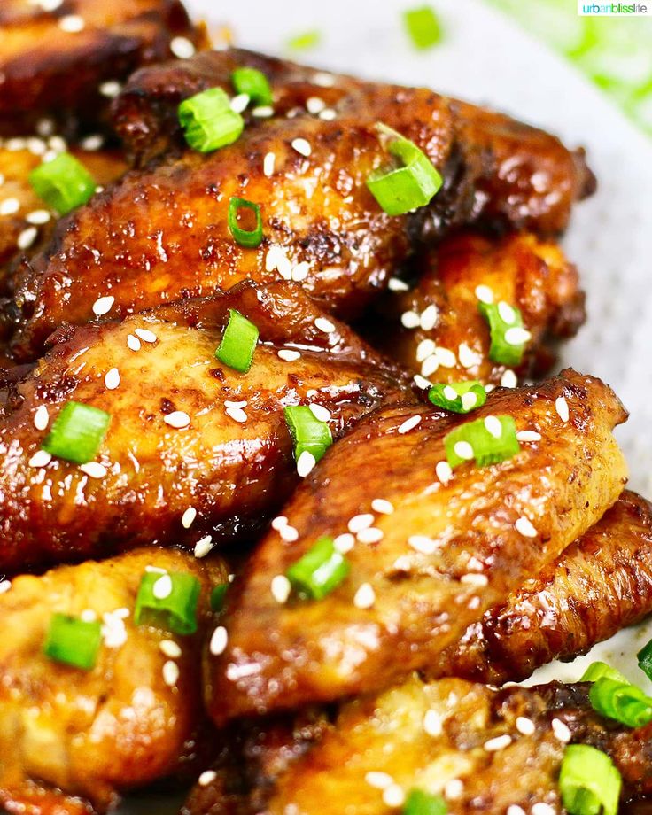 chicken wings with sesame seeds and green onions