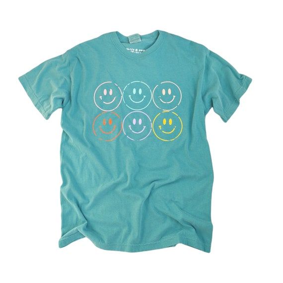 Fun Cotton T-shirt With Smiley Face, Funny Graphic Print Tops For Everyday, Funny Short Sleeve Tops For Everyday, Trendy Smiley Face Summer Tops, Fun Relaxed Fit T-shirt With Smiley Face, Relaxed Fit Smiley Face T-shirt, Relaxed Fit T-shirt With Smiley Face, Playful Relaxed Fit Shirt With Graphic Print, Playful Crew Neck Tops