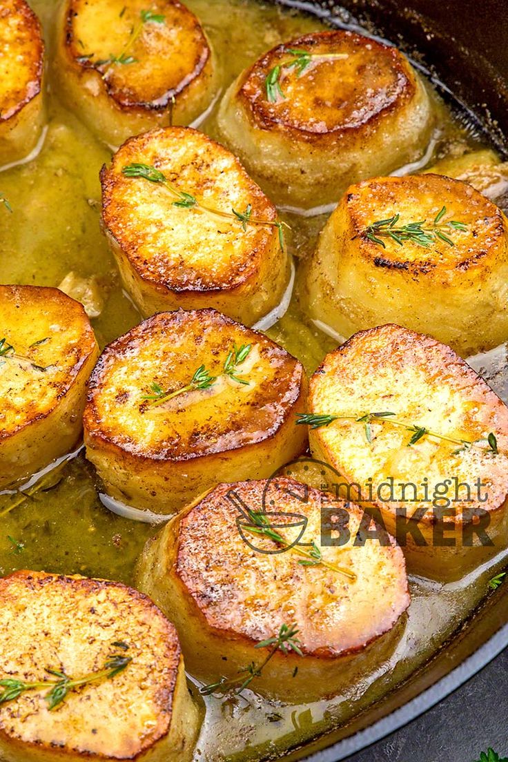 some food is cooking in a pan on the stove top and ready to be eaten