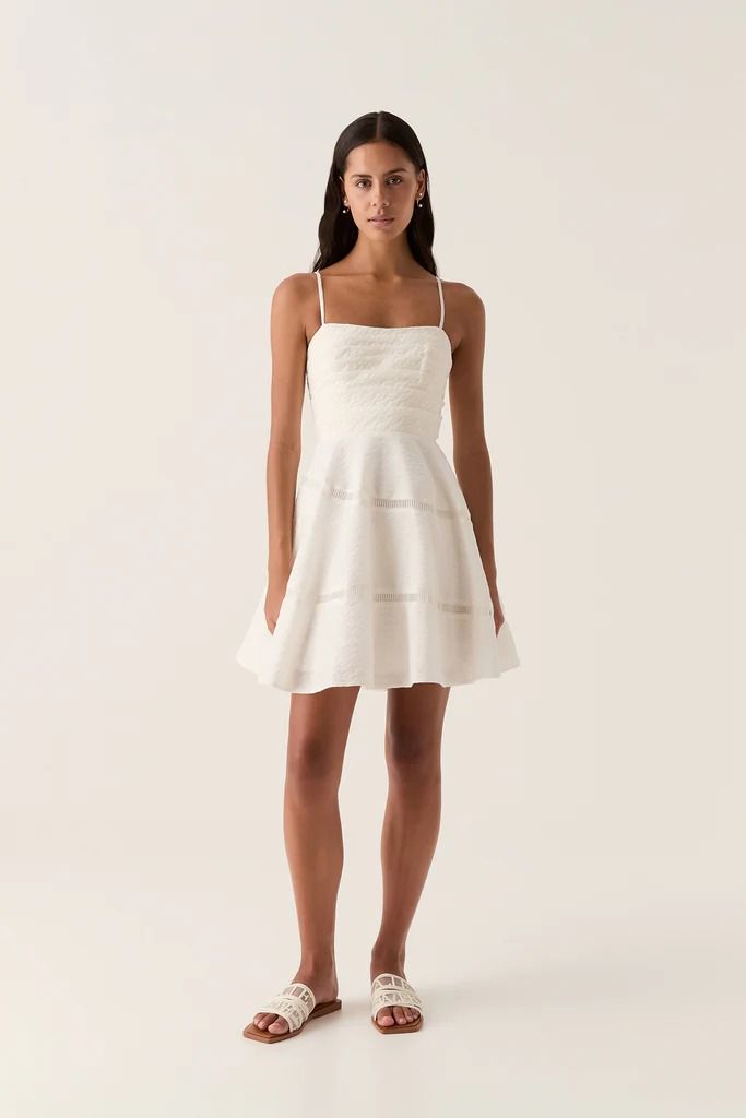 Cinque Jacquard Mini Dress | Ivory | Aje ��– Aje ROW Tiered Party Dress With Tie Straps, Spring Elegant Tiered Dress With Spaghetti Straps, Elegant Spring Tiered Dress With Spaghetti Straps, Elegant Tiered Spaghetti Strap Dress For Spring, Elegant Tiered Skirt Mini Dress For Daywear, Elegant Daywear Mini Dress With Tiered Skirt, Elegant Tiered Mini Dress With Fitted Bodice, Elegant Mini Dress With Tiered Skirt For Daywear, Fitted Dresses With Straps For Daywear