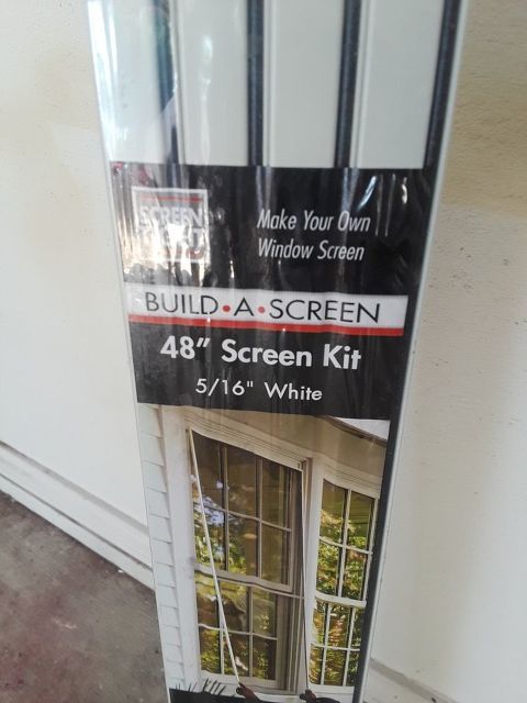 the window screen kit is open and ready to be put into the house or office