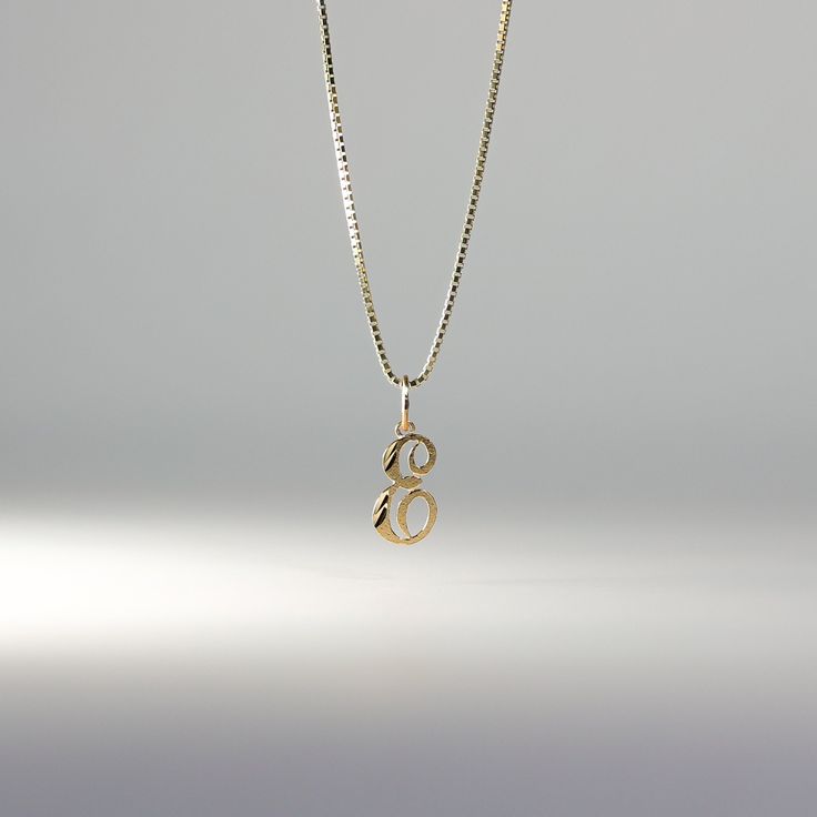 A timeless piece that will never go out of style. This 14K gold calligraphy pendant is the perfect and most stunning way of keeping a name close to your heart. We handmade each piece so you can assure you're getting a one-of-a-kind pendant that is not like any other. This 14K solid gold letter pendant is flawlessly crafted to look super chic and elegant around your neck. Pair it with a nice gold chain and wear it with almost all of your outfits. The piece is such a versatile lettering necklace. Anniversary Necklace In Recycled Gold With Initial Pendant, Elegant Charms Name Necklace For Anniversary, Elegant Initial Necklace With Box Chain As Gift, Elegant Name Necklace With Charms For Anniversary, Elegant Charm Name Necklace For Anniversary, Elegant Name Necklace With Charms For Everyday, Pendant Charm Necklace With Box Chain For Anniversary, Anniversary Pendant Initial Necklace, Elegant Gold Name Necklace With Charms