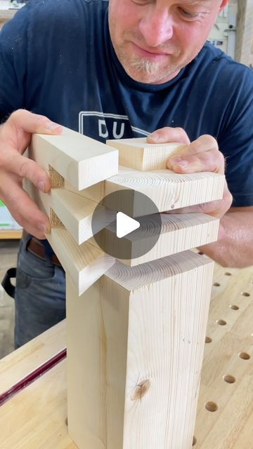 a man working on a piece of wood