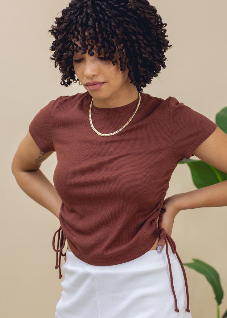 A cropped rib tee with ruching details down the side. Side drawstrings are adjustable to tailor to your own personal fit. Details • Body hugging fit • Curved bottom hem• Adjustable drawstrings• Super soft & stretchy• Garment dyedMeasurements based on size S• Chest: 14.5"• Length: 17.25"• Model is 5'8". Wearing size S. Fabric + Care • 2x1 Rib - 47% Cotton / 48% Modal / 5% Spandex• Machine wash in warm water with like colors. Do not bleach.• Tumble dry low• Sustainably & ethically made in Los Ange Fuchsia Color, Curves Workout, Crop Tee, Stretchy Material, Warm Water, Fabric Care, Soft Fabrics, Womens Sizes, V Neck