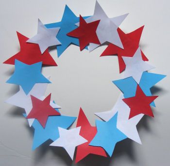 red, white and blue paper stars arranged in a circle