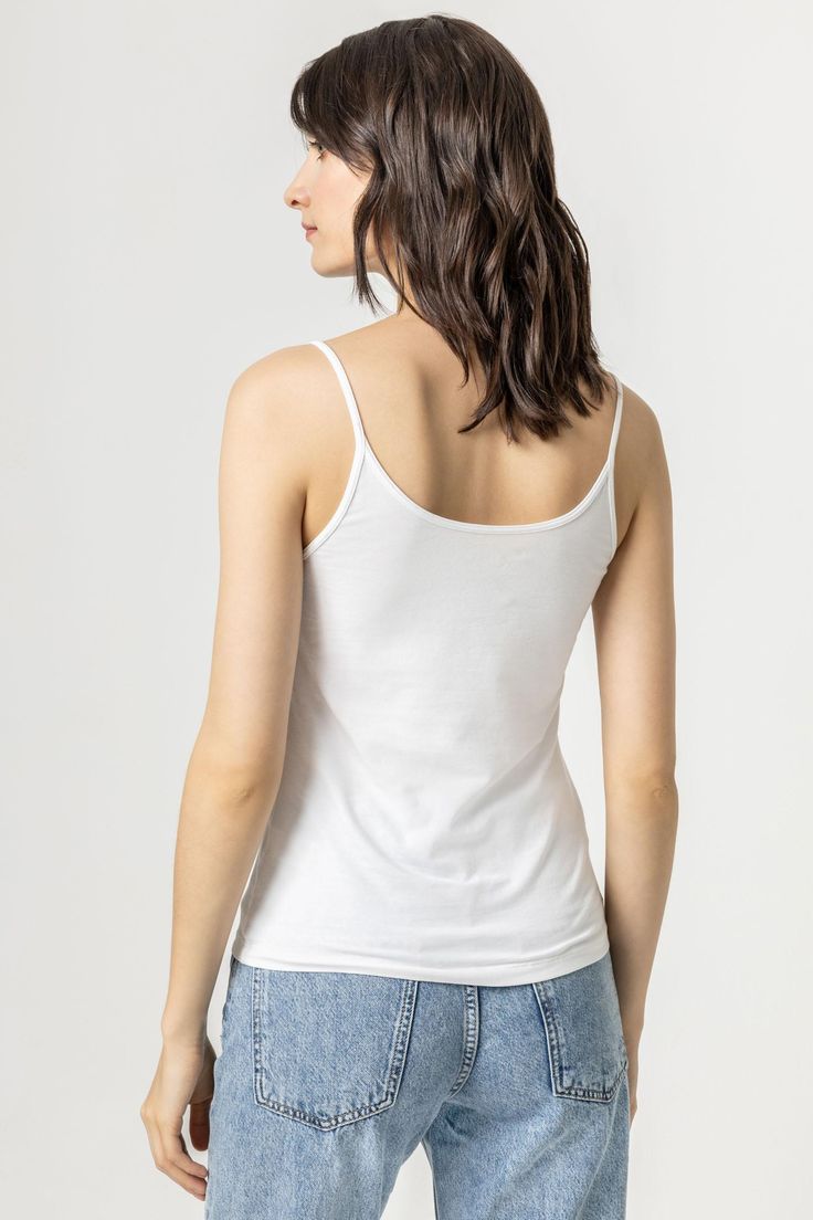 Our layering pieces have been relaunched and are better than ever! We used beautiful Pima cotton and add a touch of Spandex for the perfect fit. With narrow trims, our camisole is clean and simple and layers beautifully under any fabric. Everyday Cotton Tank Top With Built-in Bra, Cotton Tops With Built-in Bra For Daywear, Stretch Cotton Tank Top For Daywear, Cotton Seamless Camisole For Daywear, Cotton Seamless Tank Top For Daywear, Seamless Cotton Tank Top For Daywear, Seamless Cotton Camisole, Modal Tank Camisole, Basic Seamless Camisole For Everyday