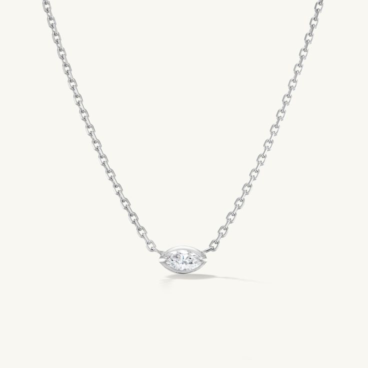 td {border: 1px solid #ccc;}br {mso-data-placement:same-cell;} Details This solid 14K gold necklace has a center prong set marquise diamond. 18" with a loop to be worn at 16". Measurements Carat Weight: 0.17 Chain Length: 16" - 18" Shipping Each piece of jewelry is carefully hand fabricated in our NYC studio so please allow 2-3 weeks for delivery. If you would like to request a rush order please contact the studio at sophie@sophieratner.com. Selecting faster shipping options will not speed up th Timeless Silver Marquise Diamond Necklace, Formal White Gold Marquise Cut Necklace, Marquise Diamond Necklace For Anniversary, Marquise Jewelry With Diamond Eyes For Anniversary, Marquise Brilliant Cut Diamond Necklace, Anniversary Marquise Jewelry With Diamond Eyes, Formal Marquise Necklace With Diamond Accents, Formal Marquise Necklaces With Diamond Accents, Elegant Marquise Single Diamond Necklace