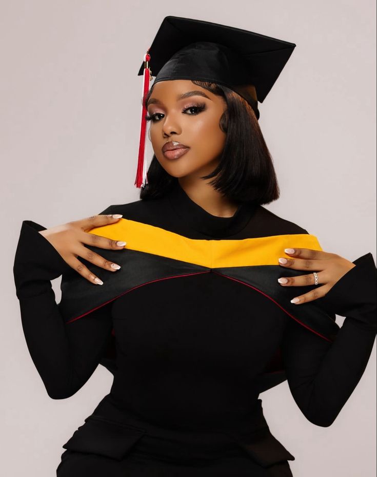 a woman wearing a graduation cap and gown