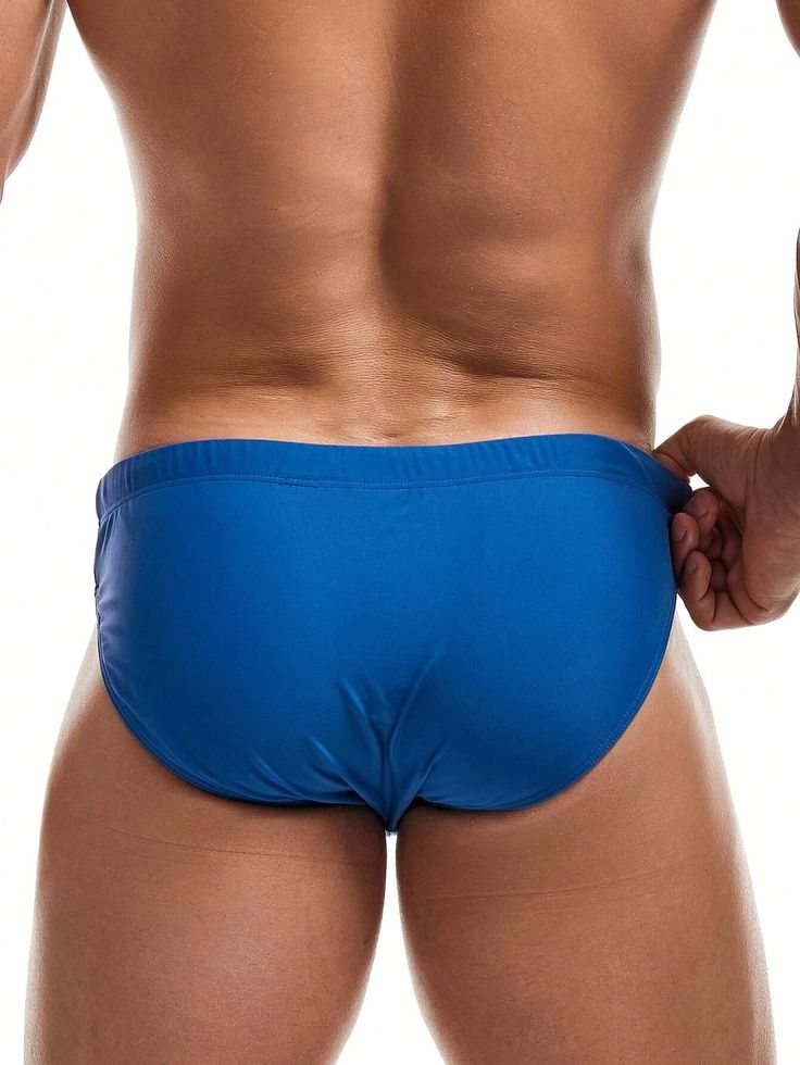 Make a splash with our High Stretch Swim Brief, a must-have for any swimwear collection. Crafted from high-quality swimsuit fabric, these briefs provide a comfortable and secure fit. The plain design exudes a timeless charm, while the vibrant blue color adds a touch of sophistication. Dive into your next aquatic adventure with confidence and style in these versatile swim briefs. Features: Color: Blue Pattern Type: Plain Type: Briefs Fabric: High Stretch Material: Swimsuit Fabric Care Instruction Blue Sporty Boxer Briefs For Beach, Blue Stretch Boxer Briefs For Beach Season, Blue Nylon Swimwear For Sports, Blue Nylon Sports Swimwear, Blue Brief Swim Trunks For Beachwear, Beachwear Swim Trunks In Brief Style, Beachwear Brief Swim Trunks, Brief Style Beachwear Swim Trunks, Blue Stretch Swim Trunks For Beach