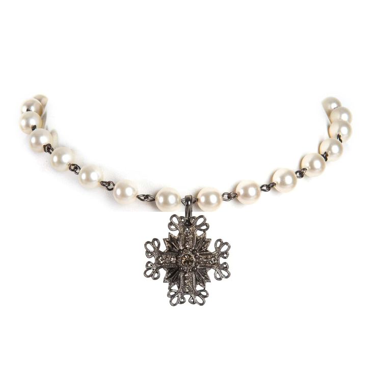 Step into your divine femininity with the Iconic Cream Pearl Choker. Whether you are a fan of the Zia (a medallion created to promote harmony for the wearer) or prefer to showcase the San Benito (a medallion that is a symbol of strength and conviction), the Pearl Choker, made with hand-selected Austrian cream pearl crystal beads, is a great way to showcase the beauty of all of our Classic or Luxury Medallions. Symbol Of Strength, Symbols Of Strength, Pearl Cream, Pearl Crystal, Pearl Choker, The Pearl, Beaded Choker, Austrian Crystal, Crystal Beads