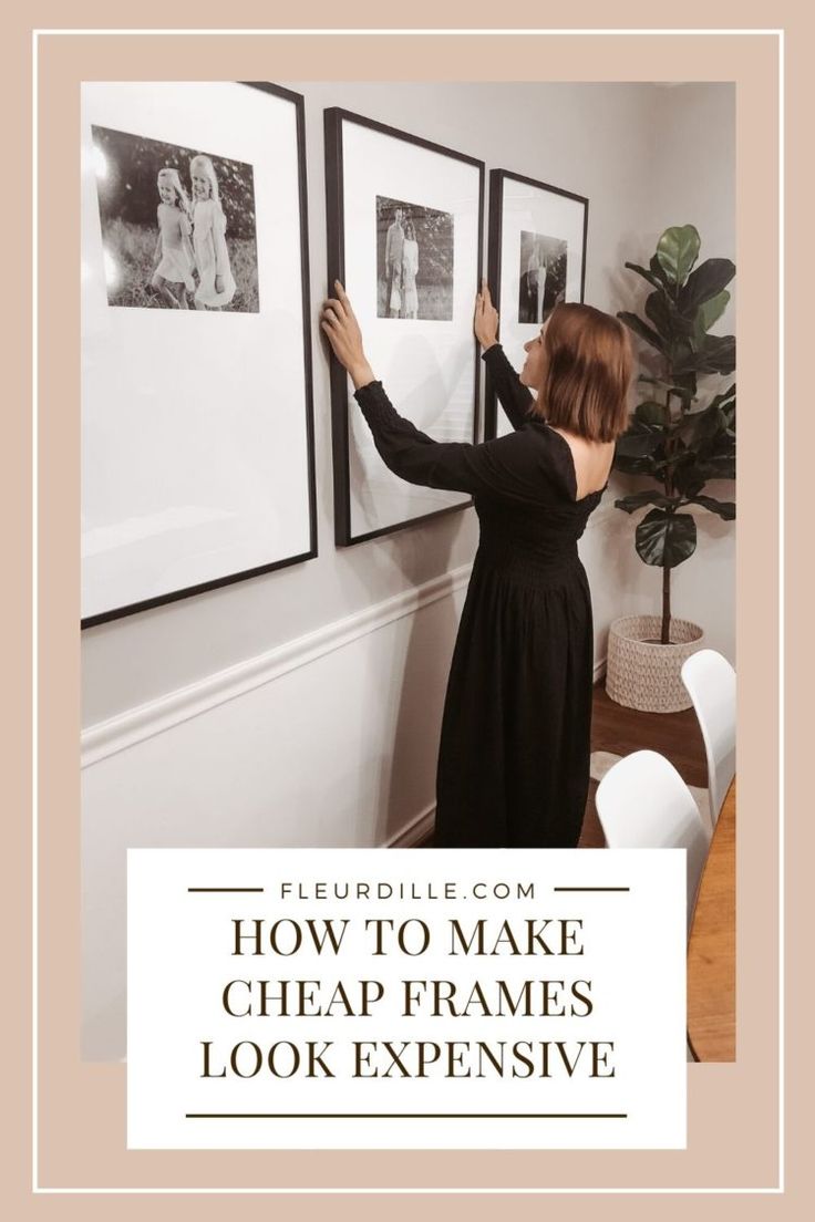 a woman hanging pictures on a wall with the words how to make cheap frames look expensive