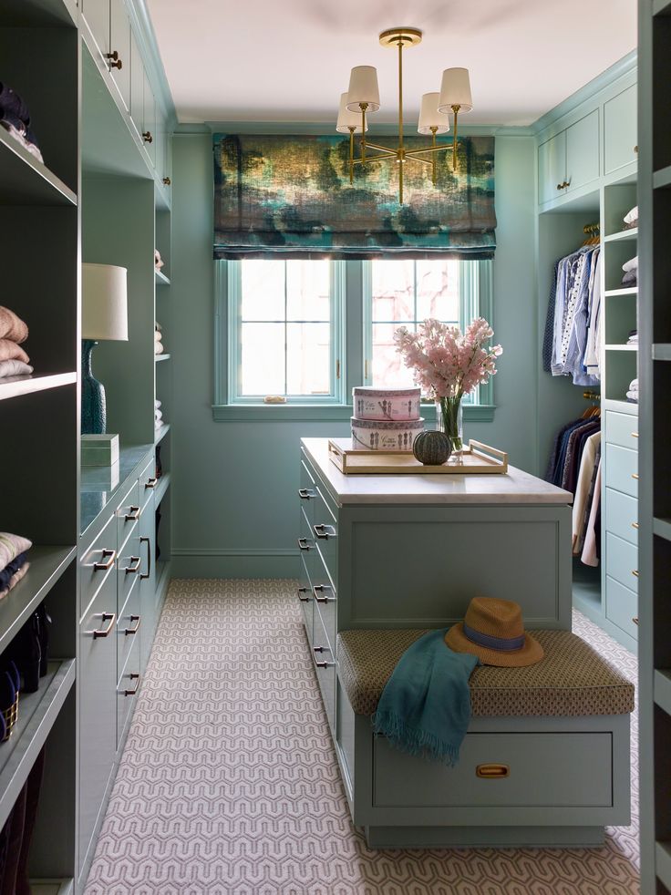 an instagramted photo of a walk - in closet with lots of shelves and drawers