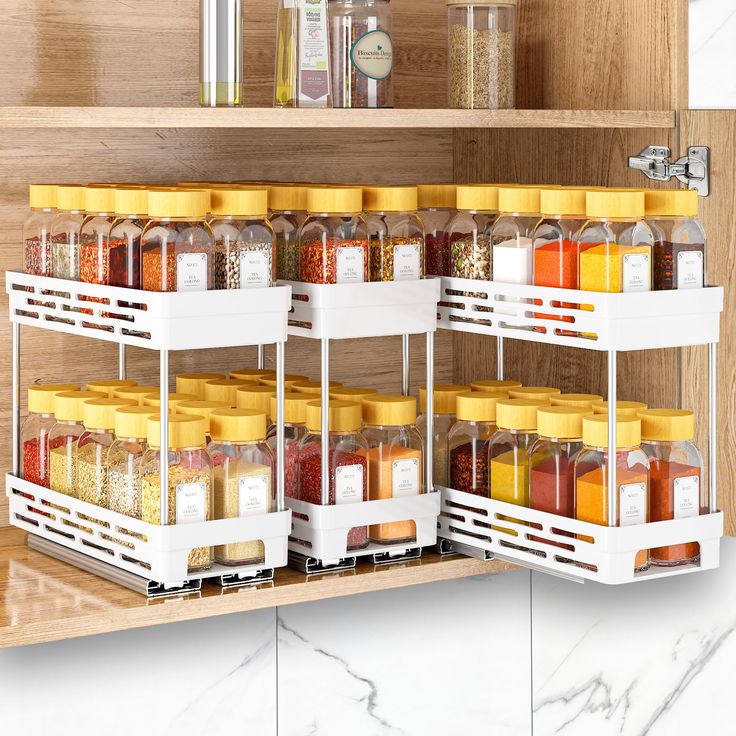 the spice rack is filled with many different types of spices