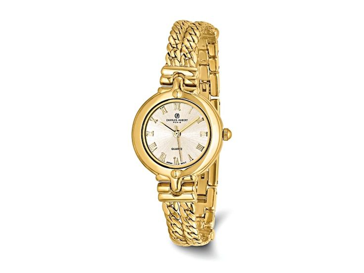 Gold tone over brass Charles Hubert ladies chain bracelet watch with 26mm round case, stainless steel caseback, push pull crown, Japanese quartz movement for accurate time, champagne dial with gold-tone hands and Roman numerals. Comes with limited lifetime warranty on movement type, 3 ATM water resistance and fold over catch clasp. Watch band measures approximately 8"L x 7/16"W. Timeless Gold-toned Stainless Steel Jewelry And Watches, Gold-tone Quartz Watch For Formal Occasions, Formal Gold-tone Watches With Round Dial, Classic Gold Stainless Steel Jewelry And Watches, Roman Numerals, Watch Band, Type 3, Quartz Movement, Gold Finish