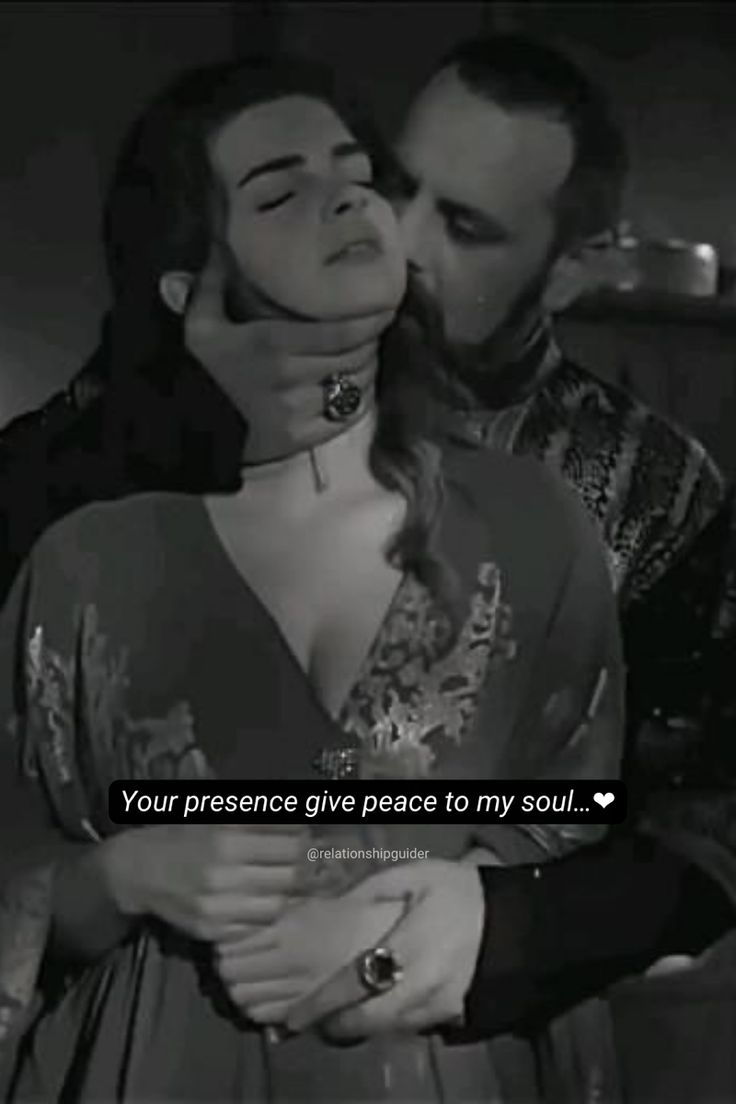 a man kissing a woman in front of a black and white photo with the words, your presence give peace to my soul