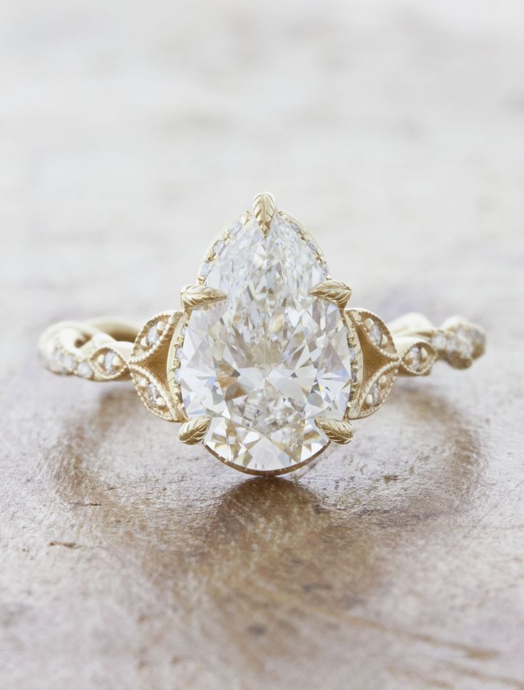 caption:2.70ct pear cut diamond Pear Engagement Ring Halo, Dream Rings, Rose Gold Diamond Ring Engagement, Oval Diamond Engagement, Oval Diamond Engagement Ring, Pinterest Ideas, Pave Band, 2024 Wedding, Twisted Band