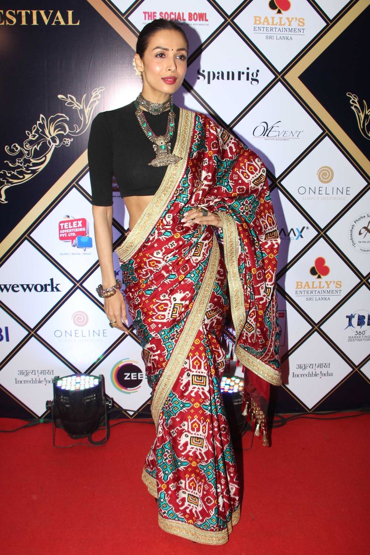 Love traditional weaves? You have to add Malaika Arora’s patola sari to your collection | Vogue India | Vogue Closet Patan Patola Saree, Bollywood Sarees Online, Traditional Silk Saree, Malaika Arora, Patola Saree, Double Weave, Silk Saree Blouse Designs, Satin Saree, Red Saree