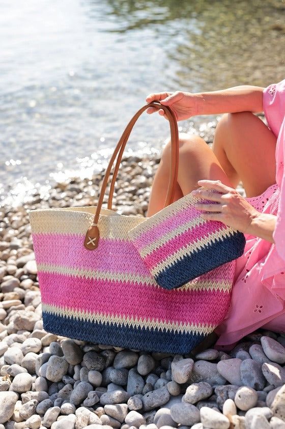 Product Details: ❥ Color: Pink ❥ Pink and navy striped ombre pattern tote bag ❥ Sleek brown stitched double handles ❥ Bring some brightness to the beach with this fun summer tote! ❥ Colorful and roomy ❥ This lightweight bag is ideal for carrying all your essentials in the warm weather ❥ The perfect accessory for all your beach vacay trips! ❥ Materials: natural paper straw and pu ❥ Double shoulder straps ❥ Magnetic snap closure ❥ 1 inner slip pockets ❥ Dimensions: 17.5" x 7" x 12" Striped Rectangular Straw Bag For Daily Use, Striped Beach Bag For Everyday Summer Use, Everyday Striped Straw Bag With Braided Handles, Striped Straw Bag With Braided Handles For Everyday Use, Striped Rectangular Bag With Braided Handles, Striped Beach Bag With Braided Handles, Rectangular Striped Shoulder Bag For Beach, Rectangular Striped Straw Bag For Summer, Striped Straw Tote Bag For Everyday Use