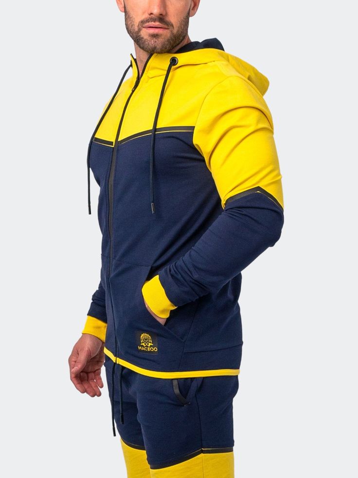 Athleisure Cotton Activewear For Streetwear, Blue Hooded Tracksuit For Streetwear, Blue Cotton Sportswear Activewear, Functional Hooded Tracksuit For Jogging, Functional Blue Cotton Activewear, Sporty Hoodie Tracksuit For Jogging, Navy Sporty Joggers For The Gym, Sporty Hooded Tracksuit For Jogging, Sporty Tracksuit With Hoodie For Jogging