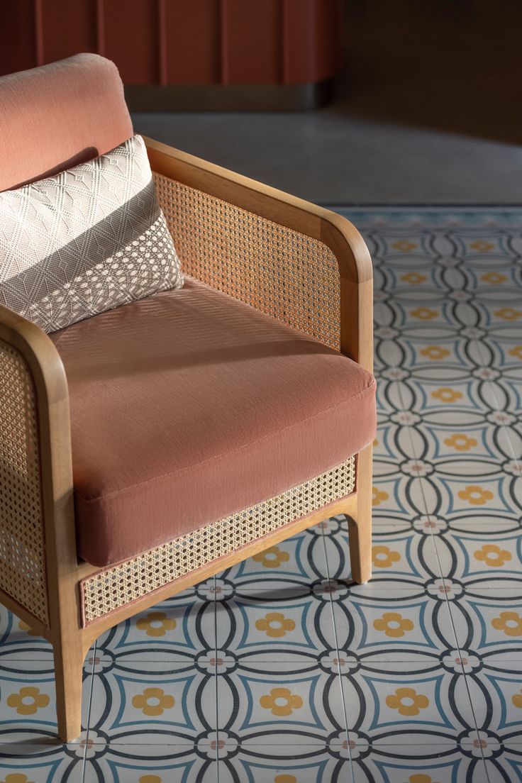 a chair sitting on top of a tiled floor