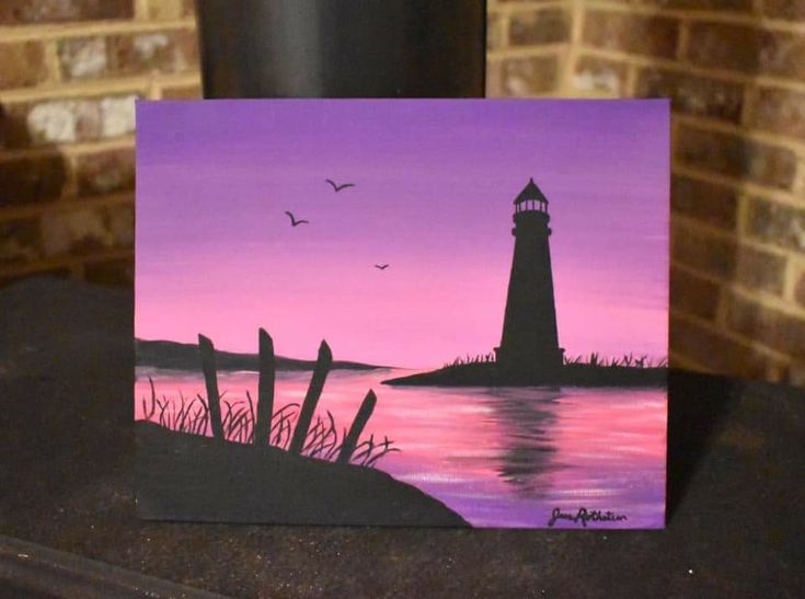 a painting of a lighthouse on a purple and pink background with seagulls flying over the water