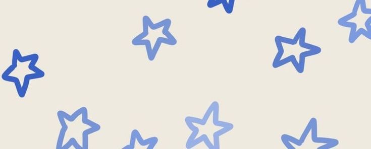 several blue stars are flying in the air