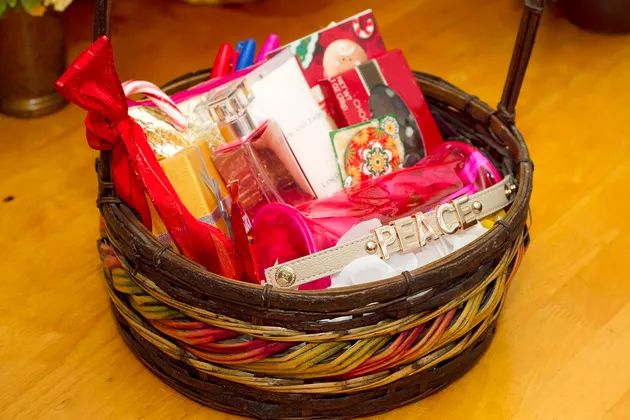 a basket filled with lots of items on top of a wooden table