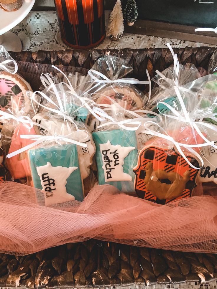 a basket filled with assorted cookies on top of a table