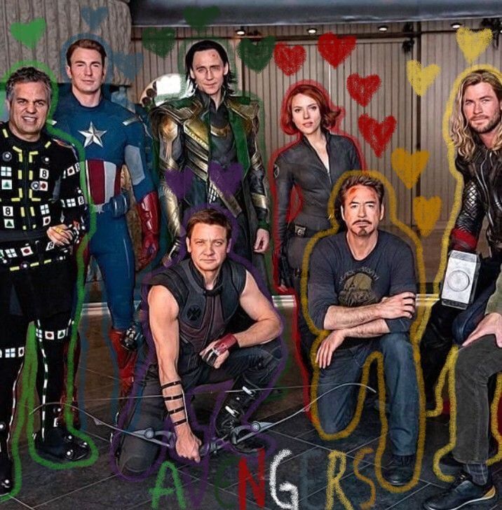 a group of people dressed in costumes posing for a photo with the caption avengers