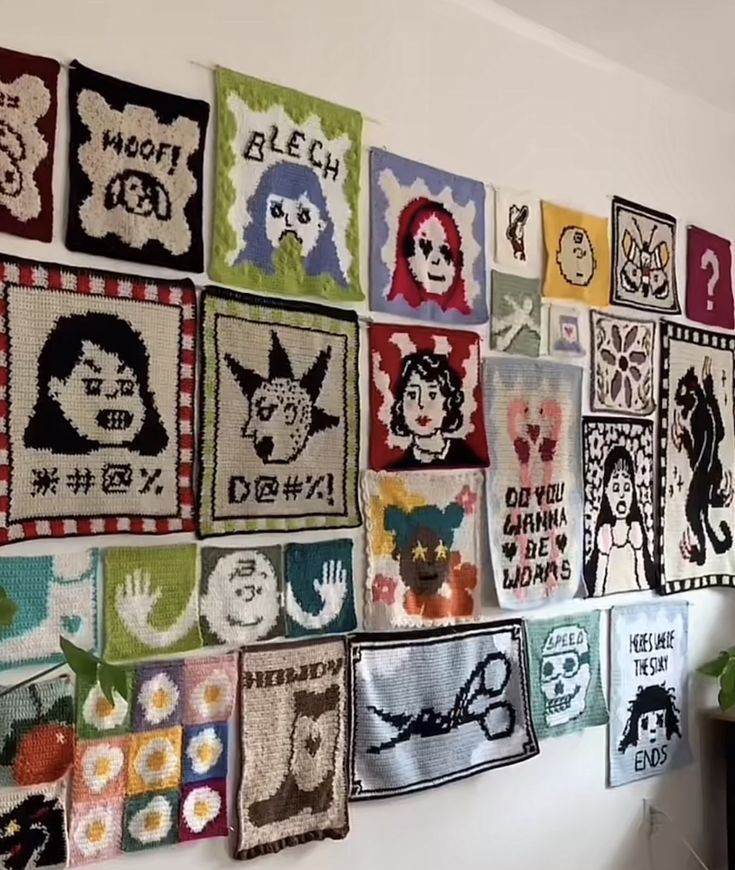 a wall covered in lots of different types of cross - stitchs on it's sides