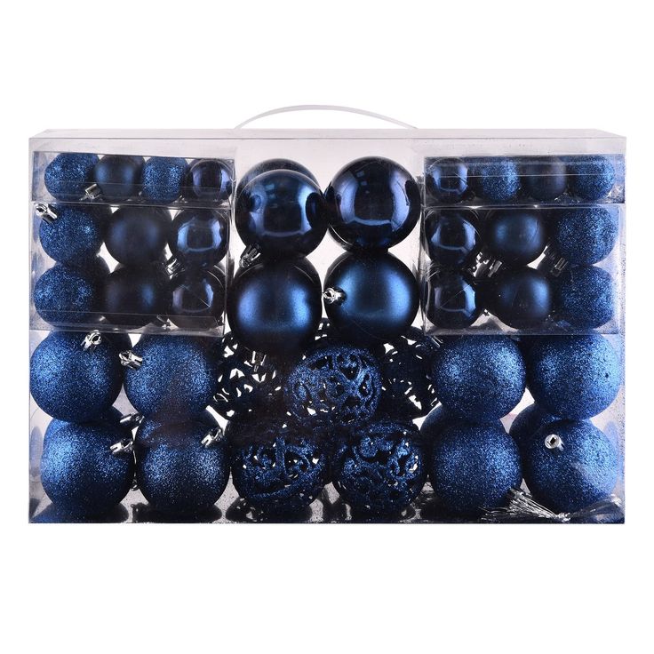 black and blue ornaments in a clear box