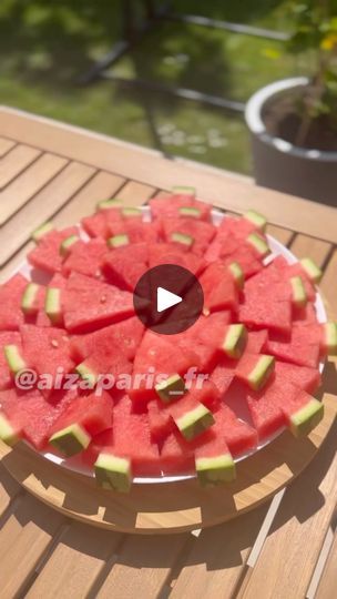 watermelon slices arranged on a glass plate