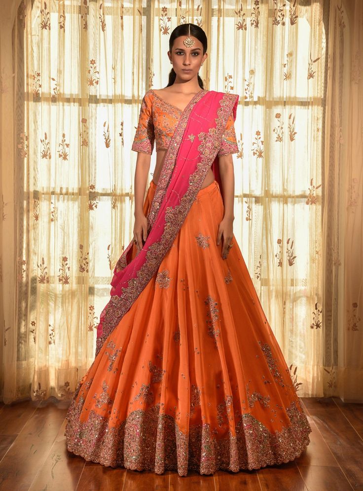 Dolly J | Gold Dust Kalidar Lehenga Set | INDIASPOPUP.COM Orange Pre-draped Saree For Wedding And Diwali, Orange Pre-draped Saree With Pallu For Wedding, Transitional Anarkali Pre-draped Organza Saree, Orange Saree For Reception With Traditional Drape, Diwali Organza Lehenga With Traditional Drape, Floor-length Organza Pre-draped Saree With Pallu, Lehenga With Pallu In Organza, Traditional Drape Orange Sharara With Sheer Dupatta, Traditional Orange Sharara With Sheer Dupatta