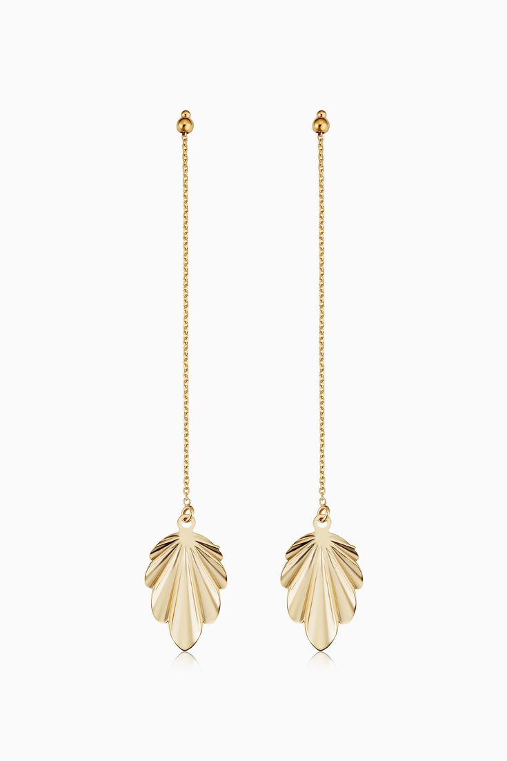 Unstoppably elegant, our Fanfare Drop Earrings will sway and shine with every turn of your head. These solid gold leaves are gently fanned and dangle from long, delicate chains for a timeless look. Metal: 14 Karat Yellow Gold Construction: Push Back Closure Weight: 1.2 Grams Origin: Crafted in Vicenza, Italy Gold Plated Hallmarked Dangle Earrings, Elegant Leaf-shaped Jewelry For Formal Occasions, Formal Yellow Gold Leaf Jewelry, Gold-tone 14k Gold Dangle Earrings, Elegant Leaf-shaped Formal Jewelry, Ornate Yellow Gold Dangle Jewelry, Yellow Gold Leaf-shaped Formal Jewelry, Elegant Leaf-shaped Formal Earrings, Elegant Leaf-shaped Earrings For Formal Occasions