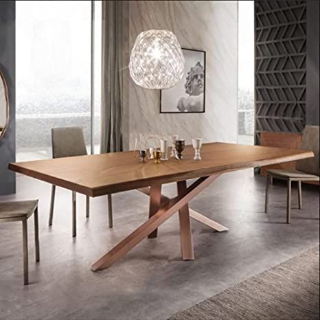 a modern dining table with two chairs and a light fixture hanging from it's ceiling