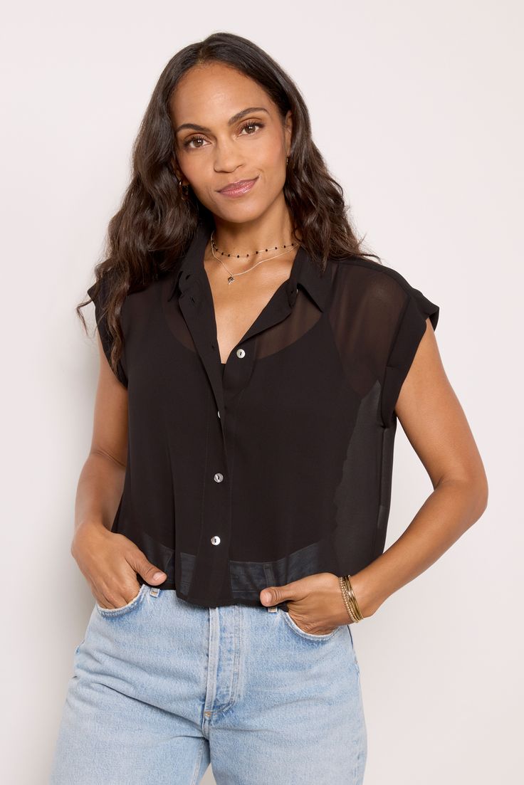 Make a statement this season with this sheer black button-down from Pistola, featuring a spread collar, rolled short sleeves, and a cropped length. Pair with a cami underneath and your favorite jeans for a chic look. Casual Sheer Button-up Blouse, Sheer Collared Summer Top, Sheer Collared Top For Summer, Summer Sheer Collared Tops, Collared Cropped Shirt For Day Out, Chic Cropped Shirt With Button Closure For Day Out, Chic Cropped Shirt For Day Out, Sheer Button-up Summer Top, Sheer Collared Summer Blouse