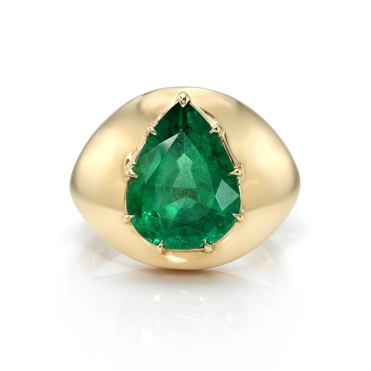 4.08ct pear shaped green emerald prong set in a handcrafted 18K yellow gold domed mounting. Teardrop Emerald Ring In Yellow Gold, Classic Green Teardrop Emerald Ring, Classic Teardrop Emerald Ring For Formal Occasions, Teardrop Emerald Ring For Formal Occasions, Gold Teardrop Emerald Ring, Green Teardrop Emerald Ring For May Birthstone, Gold Emerald Pear-shaped Ring, Gold Pear-shaped Emerald Ring, Classic Pear-shaped Emerald Ring