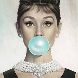 an image of a woman with a bubble in her mouth