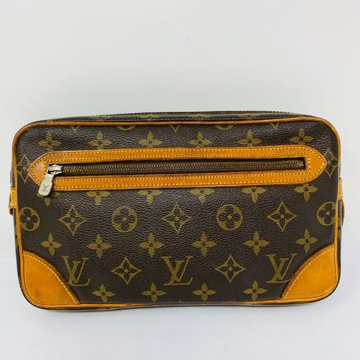 Authentic, good preowned condition Made in France. Date code 853  Exterior : good  Interior: clean with some scratches in small pockets.  Zipper works well Measurements: H6, L10, W1 Louis Vuitton Cosmetic Bag, Interior Clean, Best Interior, Cosmetic Bags, Declutter, Made In France, Louis Vuitton Monogram, Cosmetic Bag, Louis Vuitton