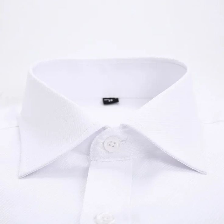 Upgrade your style with this classic cufflink shirt, perfect for any occasion!! Available in a range of basic and vibrant colors, this long-sleeve shirt offers timeless sophistication. Embrace effortless style with this must-have wardrobe essential. Classic Formal Dress Shirt With Button Cuffs, Solid Dress Shirt For Office, Solid Color Collared Dress Shirt For Office, Solid Collared Dress Shirt For Office, Business Dress Shirt With Button Cuffs And Collar, Elegant Solid Color Dress Shirt For Office, Classic White Dress Shirt For Office, Elegant Solid Dress Shirt For Office, White Dress Shirt With Button Cuffs For Office