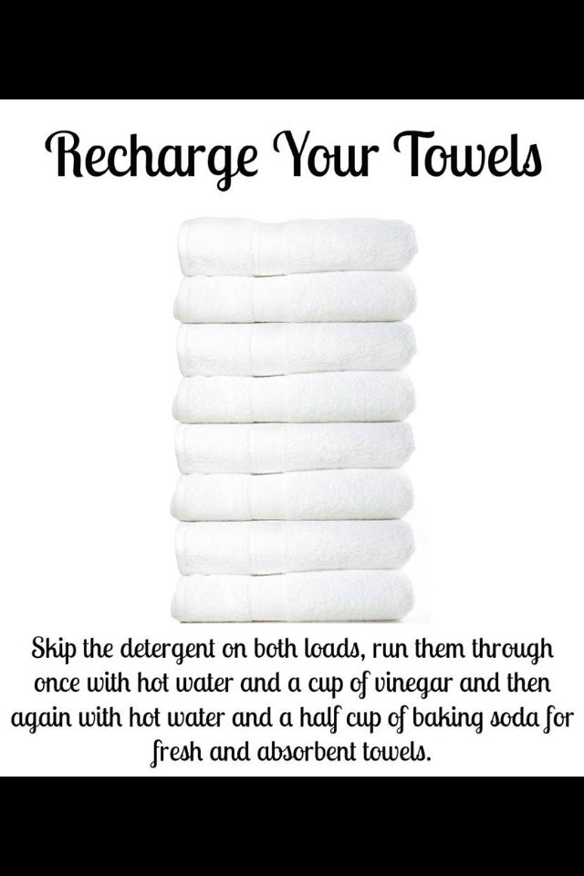 a stack of white towels with the words recharge your towels