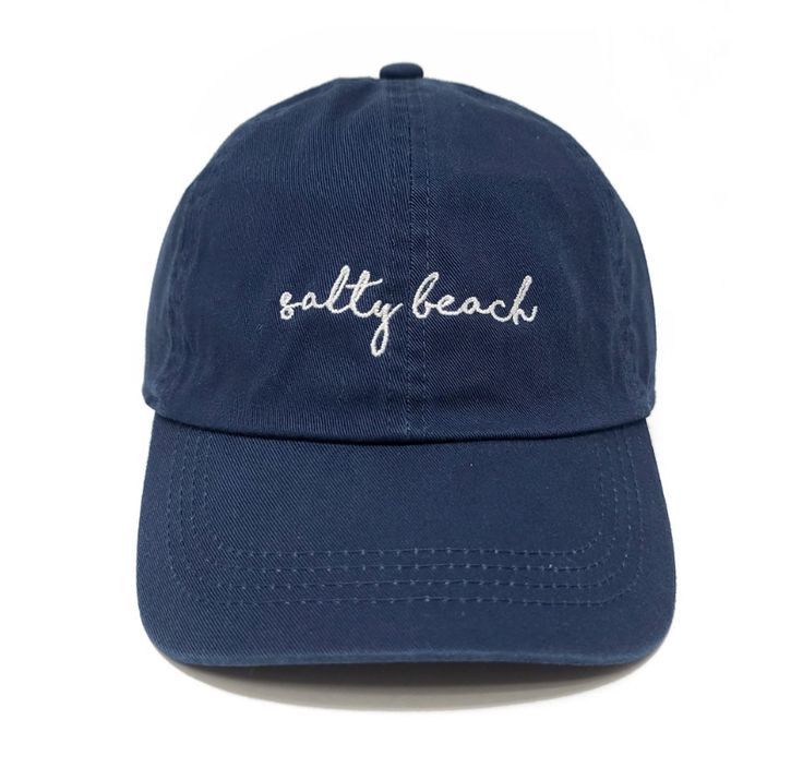 Catch some waves and stay shaded in our Embroidered Salty Beach Baseball Cap! Its adjustable buckle slide ensures it fits most, with 100% cotton to keep you comfy. Perfect for beach days, fishing trips, or summer hikes! Let's get salty! Adjustable Cotton Dad Hat For Beach, Cotton Beach Baseball Cap, Summer Cotton Baseball Cap With Adjustable Fit, Adjustable Navy Baseball Cap For Beach, Beach Baseball Cap With Embroidered Logo, Adjustable Beach Baseball Cap With Embroidered Logo, Casual Beach Hats With Embroidered Logo, Casual Beach Hat With Embroidered Logo, Casual Adjustable Sun Hat With Embroidered Logo