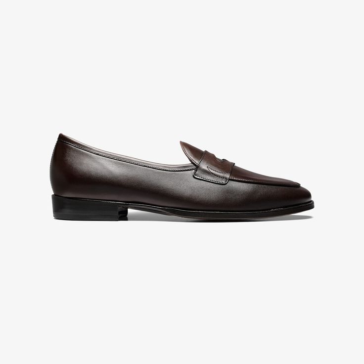 Step into these smart brown penny loafers for a timeless style that's simultaneously casual and effortlessly refined. Crafted in Portugal from supple Italian leather with a leather sole. Classic Calf Leather Slip-ons With Brogue Detailing, Business Brown Slip-ons With Leather Lining, Classic Brown Slip-ons With Stitched Sole, Classic Brown Plain Toe Slip-ons, Classic Calf Leather Slip-ons For Office, Timeless Slip-on Loafers With Leather Lining, Classic Business Slip-ons With Plain Toe, Timeless Business Slip-ons With Rubber Sole, Classic Slip-on Calf Leather Loafers