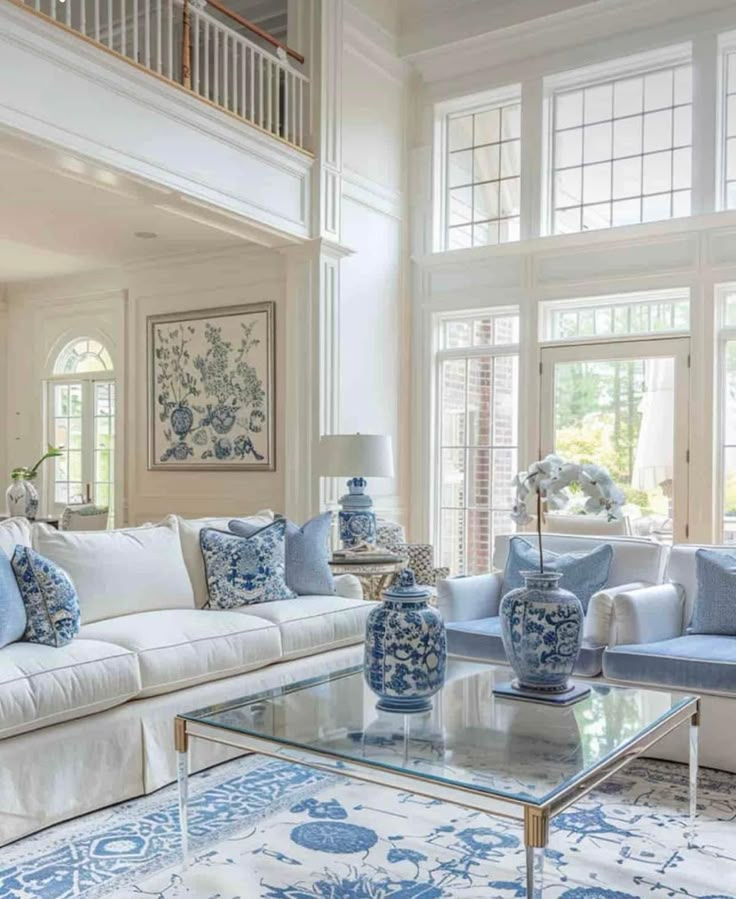 a living room with blue and white decor