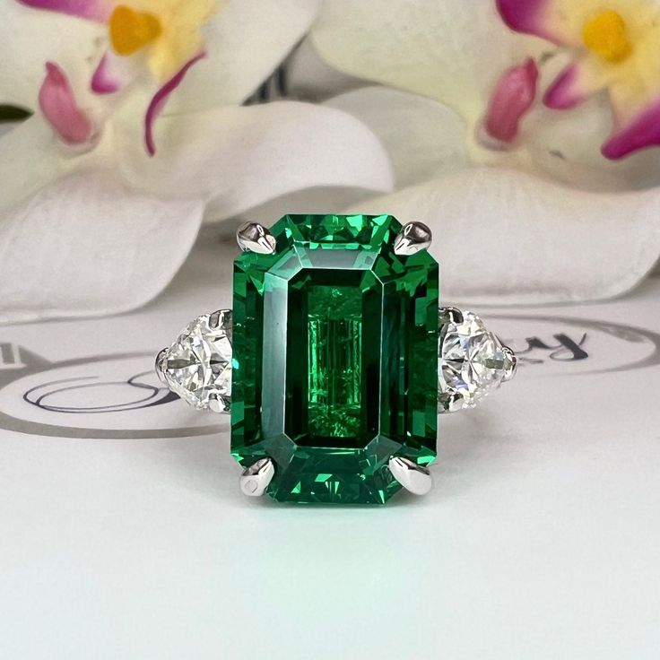 Sleek sellouts! 🤓. Order Emerald Cut Emerald Engagement Ring 14K Solid gold With Lab Grown Diamond Pear Shaped Accents , May Birthday Gift For Her Handmade Jewelry at $2000.00 #14kSolidGold #TrendyGiftForHer #MayBirthday #HandmadeJewelry #EmeraldRing #EngagementRing #LabGrownDiamond #GiftForHer #PearShapedRing #EmeraldCut Luxury Classic Teardrop Emerald Ring, Luxury Pear-shaped Emerald Ring Gift, Luxury Trillion Cut Emerald Jewelry, Elegant Trillion Cut Gia Certified Emerald Ring, Elegant Gia Certified Trillion Cut Emerald Ring, Luxury Green Trillion Cut Jewelry, Elegant Vvs Clarity Trillion Cut Emerald Ring, Elegant Gia Certified Trillion Cut Jewelry, Luxury Pear-shaped Ring As Gift