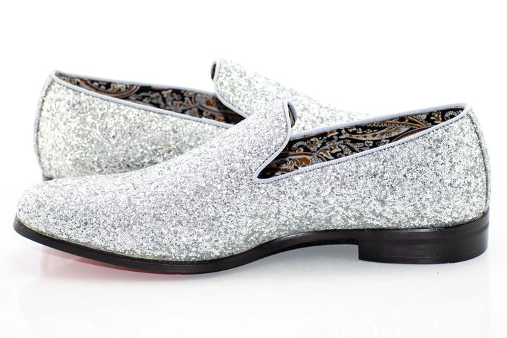 Create a smooth impression in this boldly styled dress loafer with smooth curves and a sleek silhouette to accent its bright, glittered exterior, making it a great final touch to more flamboyant suit and tuxedo outfits. Men's Dress Loafer PU Leather Upper Rubber Sole Embedded Glitter Plain-Toe Slip-On Imported Mens Dress Loafers, Dress Loafers, White Glitter, Silver Glitter, Wedding Outfit, Men Dress, Pu Leather, Leather Upper, Loafers