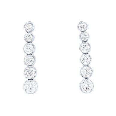 An elegant look for any occasion these earrings feature round brilliant cut diamonds graduating in size. Classic Diamond White Linear Earrings For Formal Occasions, Classic Diamond White Linear Earrings For Formal Events, Classic Formal Linear Earrings In Diamond White, Classic Diamond White Linear Earrings, Classic Brilliant Cut Drop Earrings, Classic Diamond White Linear Drop Earrings, Classic White Gold Linear Earrings, Classic Diamond Linear Earrings For Formal Occasions, Classic Linear Earrings With Diamond Accents In Diamond White